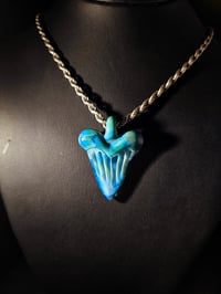 Image 1 of Silver aqua & blue slyme ahark tooth pendant.