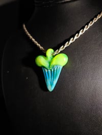 Image 1 of Silver aqua & green slyme shark tooth pendant.