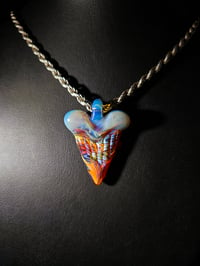 Image 1 of Mixed color shark tooth pendant with cfl top.