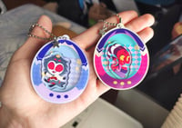 Image 4 of PREORDERS Helluva Boss Tamagotchis Acrylic Shaker Keychains