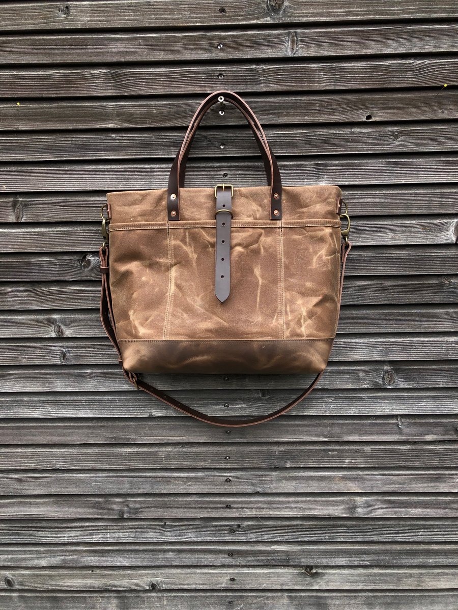 Image of  Tote bag in waxed canvas with leather bottom and cross body strap