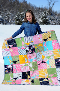 Image 2 of Spinning Stars Quilt, featuring In the Meadow