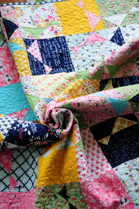 Image 4 of Spinning Stars Quilt, featuring In the Meadow