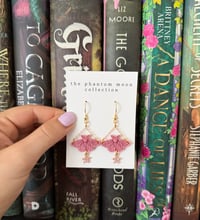 Image 1 of Pink Moth with Flower