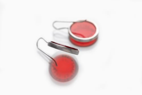 Image of "Sun is the end and the .." silver earrings with red acrylic glass 20mm · SOL FINIS ET ORTUS ·