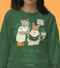 Image 1 of Kit Goes to the Dentist Sweatshirt