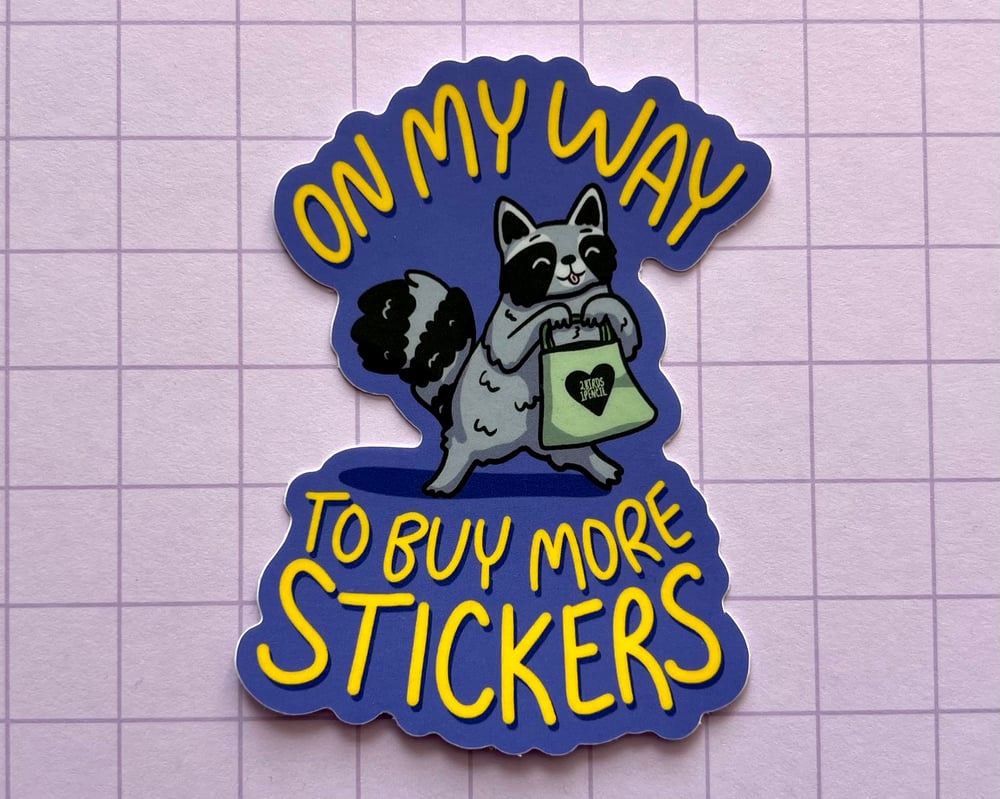 Image of Sticker collecting raccoon vinyl sticker