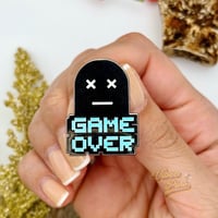 Image 4 of Glow In The Dark Game Over Enamel Pin