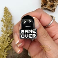 Image 2 of Glow In The Dark Game Over Enamel Pin