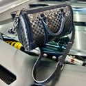 Signature Tailwag Carbon Fiber Purses