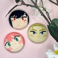 Image of forger family plush buttons