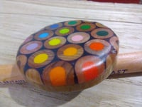 Image of round pencil brooch