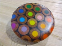 Image of round pencil brooch