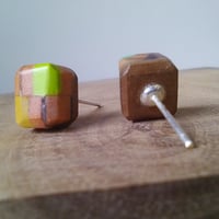 Image of teeny tiny square-ish pencil studs