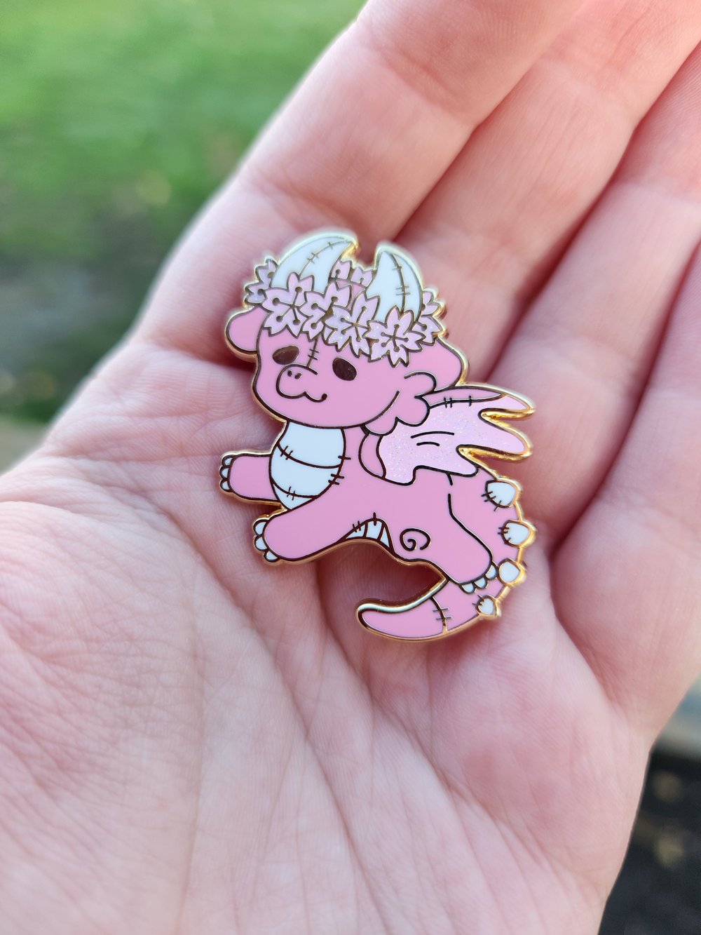 Image of Sakura plush dragon pin