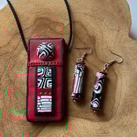 Image of Ketting met hanger en oorbellen
