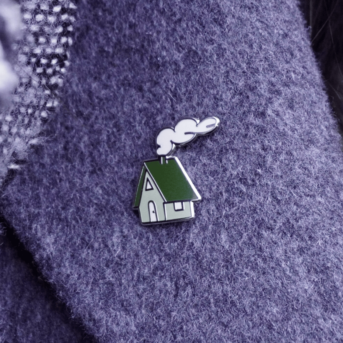 Image of little house pin badge