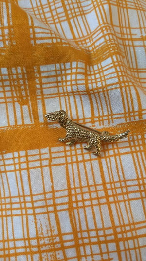 Image of Vintage gold tone daschund brooch 
