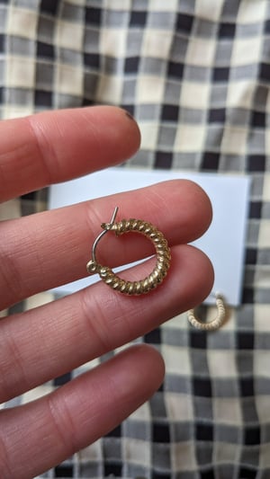 Image of Vintage gold toned small twist hoop earrings