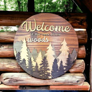 Image of Welcome to Our Neck of the Woods Sign