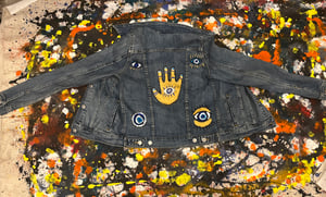 Image of Evil Eye Protection  painted on Levi’s Denim Jacket - acrylic paint/markers 