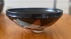 Shallow bowl with black and white glazes