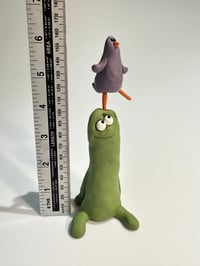 Image 4 of Dancing bird on a green thing