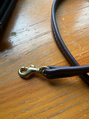 Image of frame clutch with removable strap 