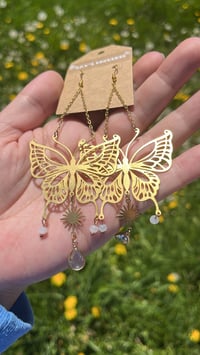 Image 1 of White Light Butterfly Sun Earrings ✨🤍🌞