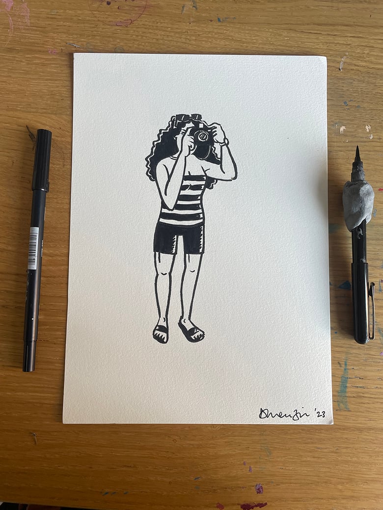 Image of A4 Ink drawing of a person with a camera.