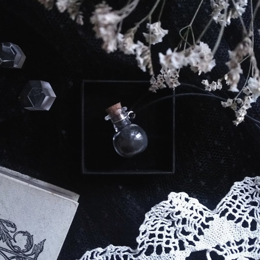 Image of DEA MARICA. BLACK WITCHES SALT AMULET ↟ protection - glass bottle, cork, ethical silver holder