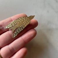 Image 2 of migration pin