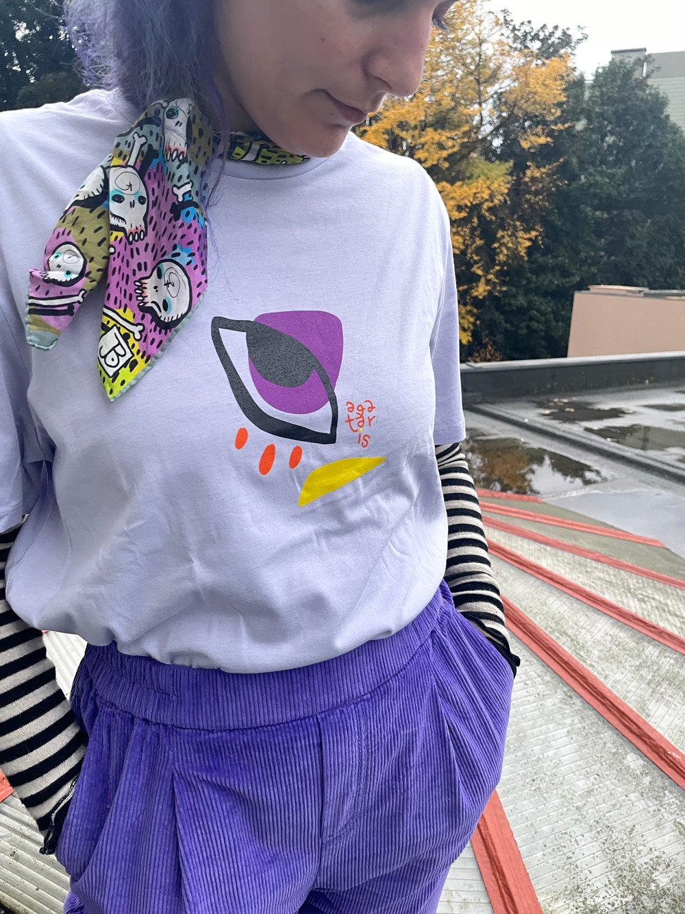 Image of Face lilac tshirt