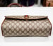Image of Vtg. Gucci Brown Monogram Clutch Bag