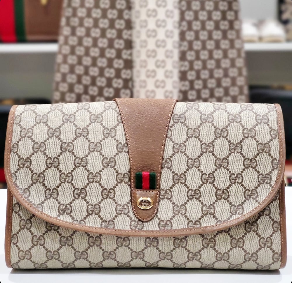 Image of Vtg. Gucci Brown Monogram Clutch Bag
