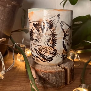 Small mug with wolves