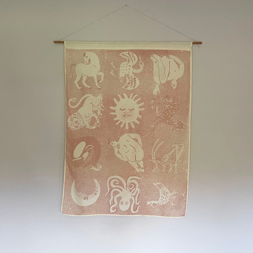 Lithographed beasts silk wall hanging - pink on cream