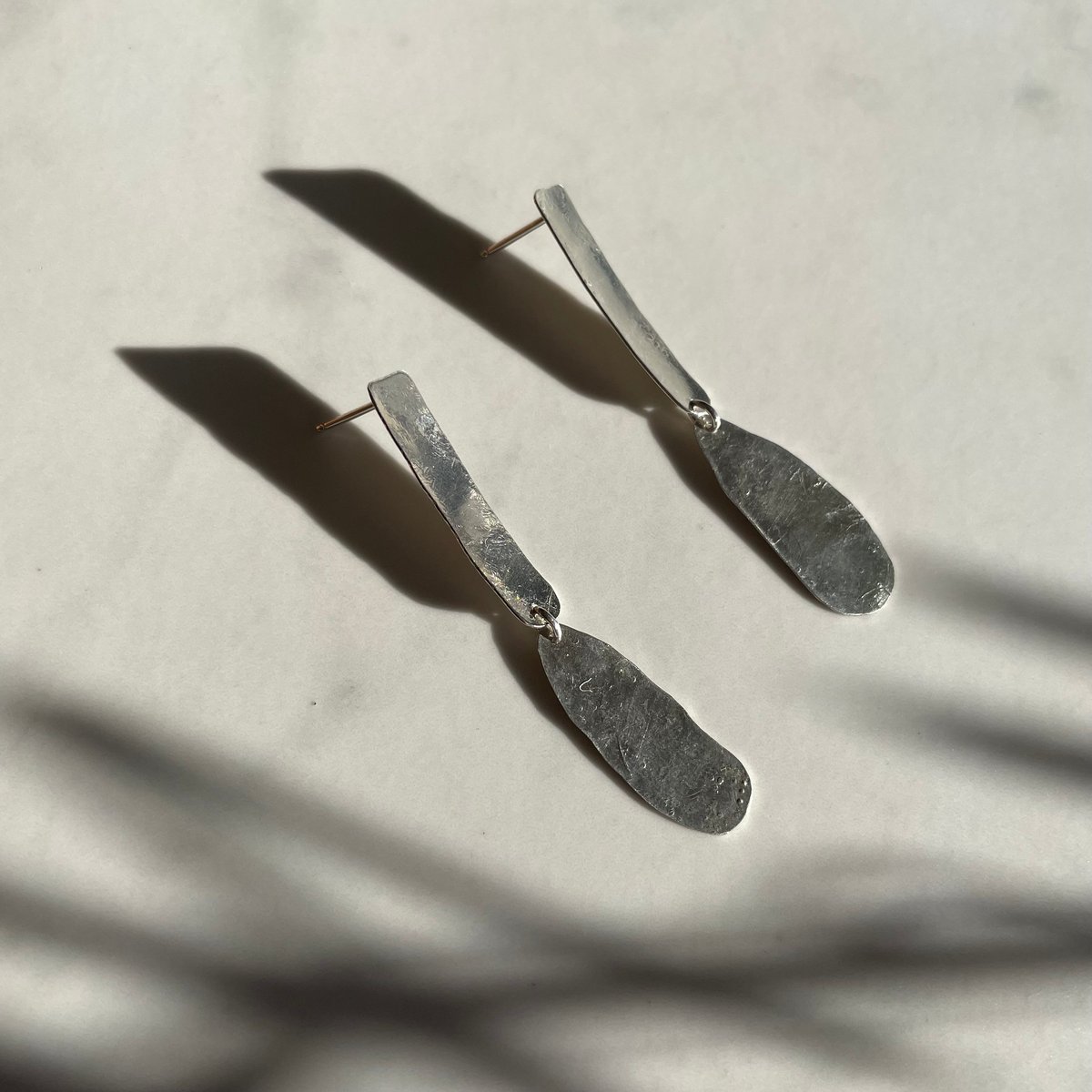 Image of sine earring