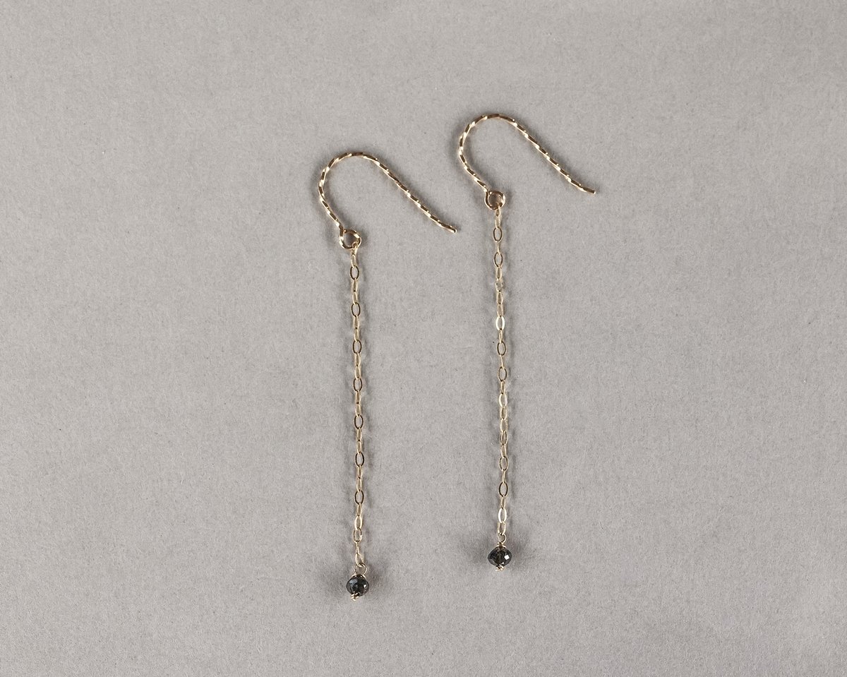 Image of 9ct yellow gold long chain grey diamond bead earrings