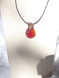 Image of Pink red orange transparent cloisonne enamel on copper pendant with bronze and cz bail