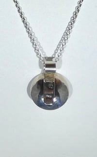 Image of Sterling silver nested bowl pendant with garnet