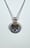 Image of Sterling silver nested bowl pendant with garnet