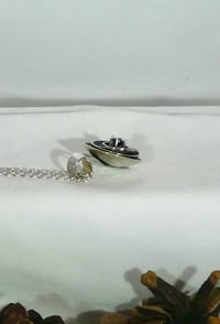 Image of Sterling silver nested bowl pendant with garnet