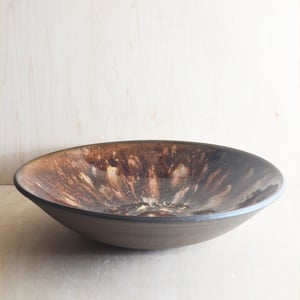Image of mottled brown serving bowl