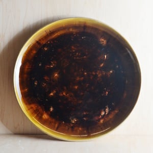 Image of mottled amber serving plate