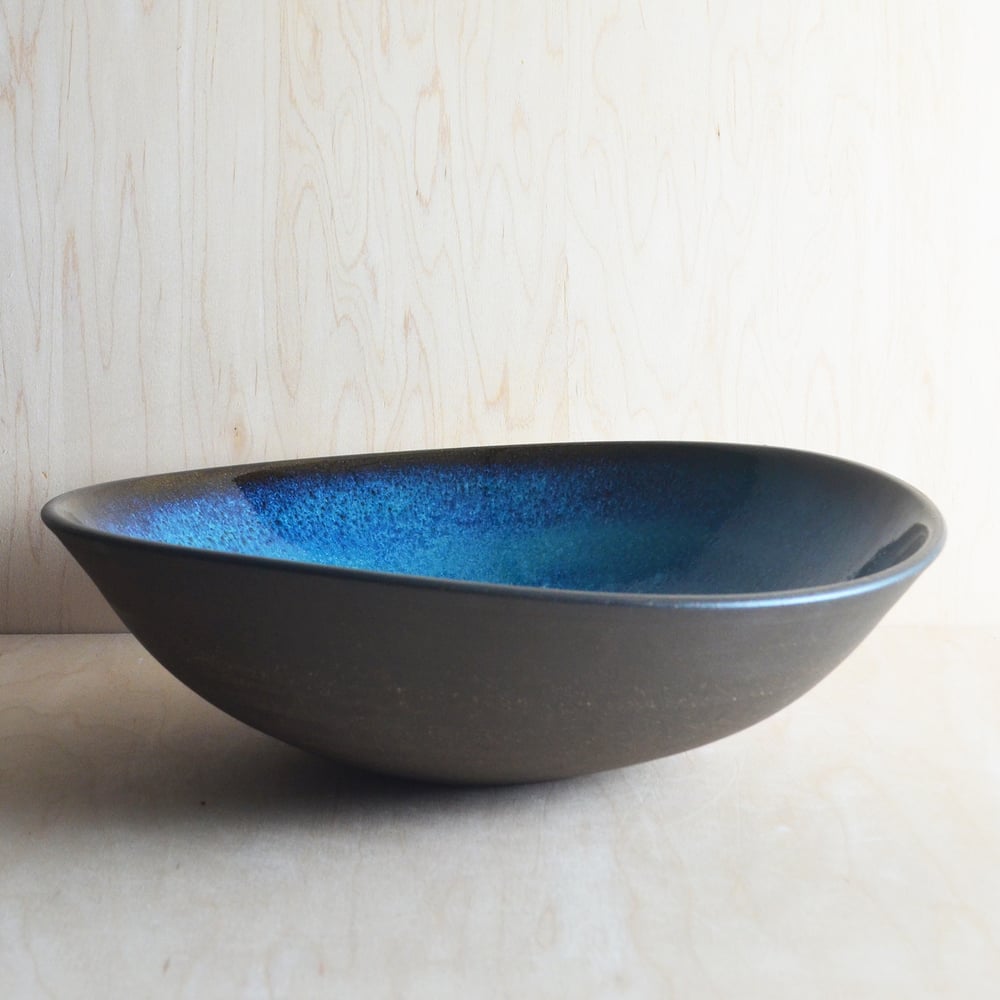 Image of deep teal altered serving bowl