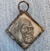 Image 1 of Gorilla Fist and Face 1888 book charm