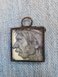 Image 1 of Primitive Man & Woman 1888 charm