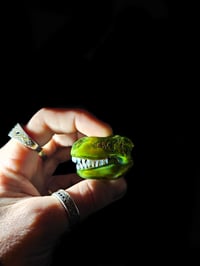 Image 1 of Mini green opal T-rex skull pendant. 