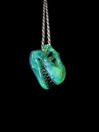 Image 2 of Sea slyme T-rex skull pendant. 